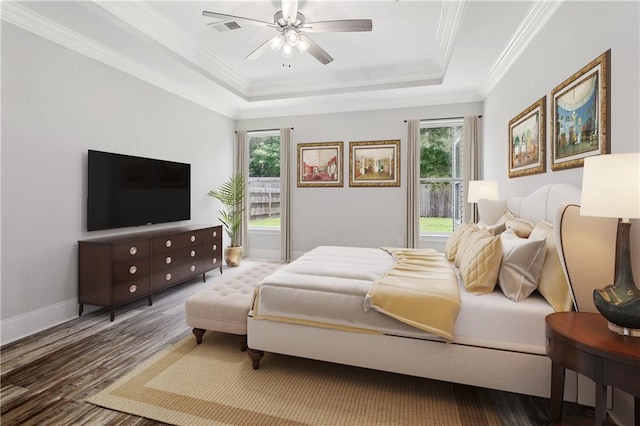 322 Palermo Dr, Slidell, LA 70458 - bedroom with a raised ceiling, wood finished floors, ornamental molding, and ceiling fan