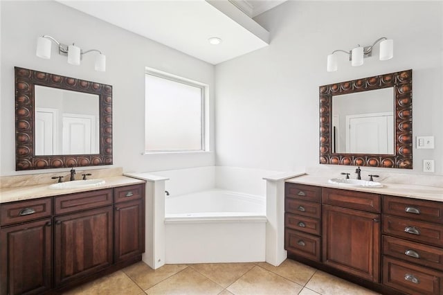 322 Palermo Dr, Slidell, LA 70458 - full bathroom with two vanities, a garden tub, and tile patterned flooring