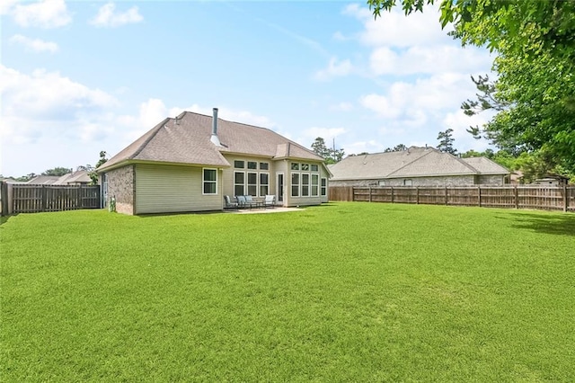 322 Palermo Dr, Slidell, LA 70458 - back of property featuring a patio and a fenced backyard