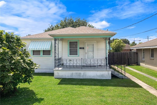 230 Jules Ave, Jefferson, LA 70121 - view of front facade featuring covered porch and a shingled roof