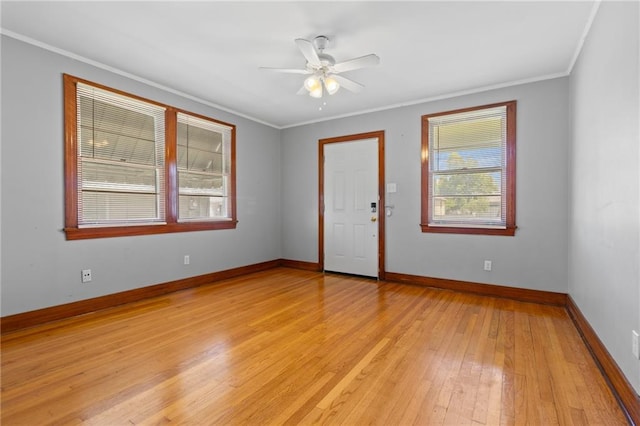230 Jules Ave, Jefferson, LA 70121 - spare room featuring ceiling fan, light wood-style floors, crown molding, and baseboards