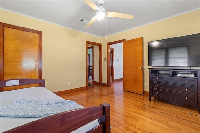 230 Jules Ave, Jefferson, LA 70121 - bedroom with light wood finished floors, crown molding, baseboards, and a ceiling fan