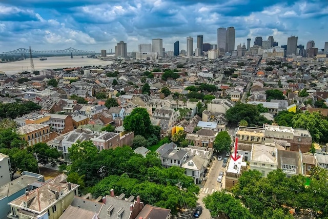 1323 Dauphine St Unit 3, New Orleans, LA 70116 - aerial overview of property's location with skyline and a notable bridge