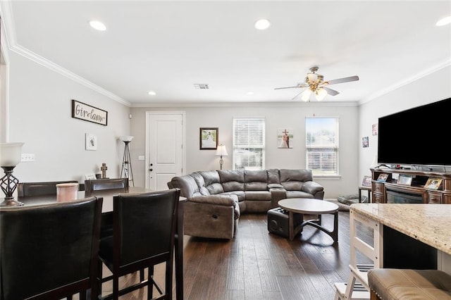 1233 Brockenbraugh Ct, Metairie, LA 70005 - living room featuring a ceiling fan, recessed lighting, dark wood-style flooring, and ornamental molding