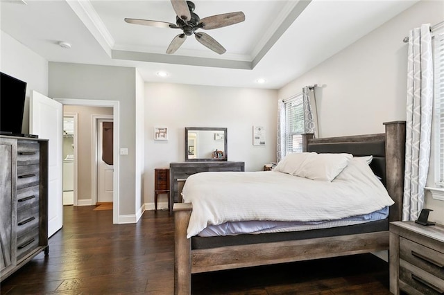 1233 Brockenbraugh Ct, Metairie, LA 70005 - bedroom with a tray ceiling, dark wood-style flooring, recessed lighting, ornamental molding, and baseboards