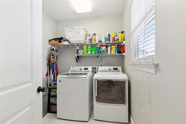 1233 Brockenbraugh Ct, Metairie, LA 70005 - laundry area with washing machine and dryer and tile patterned flooring