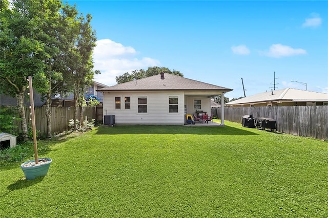 1233 Brockenbraugh Ct, Metairie, LA 70005 - back of house featuring cooling unit and a patio