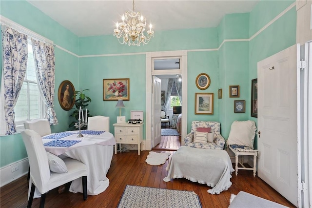 4501 Canal St, New Orleans, LA 70119 - bedroom with a chandelier and wood finished floors