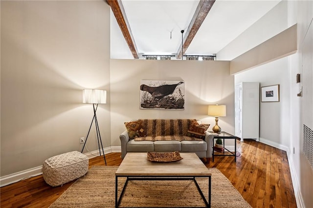 920 Poeyfarre St Unit 373, New Orleans, LA 70130 - living room with wood finished floors, baseboards, and beam ceiling