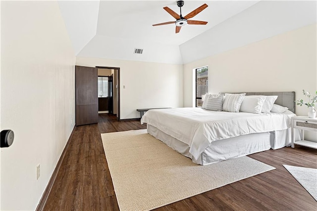 73 Doescher Dr, Harahan, LA 70123 - bedroom featuring vaulted ceiling, dark wood finished floors, ceiling fan, and baseboards
