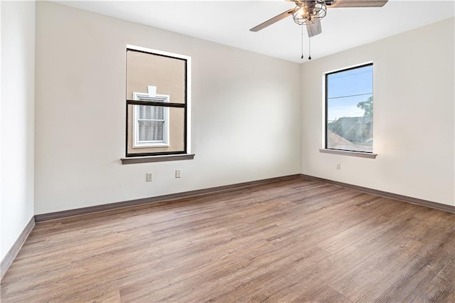 73 Doescher Dr, Harahan, LA 70123 - empty room featuring wood finished floors, ceiling fan, and baseboards