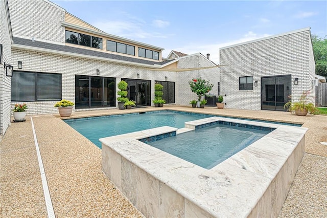 73 Doescher Dr, Harahan, LA 70123 - view of swimming pool with a pool with connected hot tub