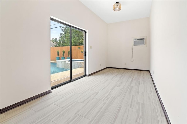 73 Doescher Dr, Harahan, LA 70123 - empty room with a wall unit AC and baseboards