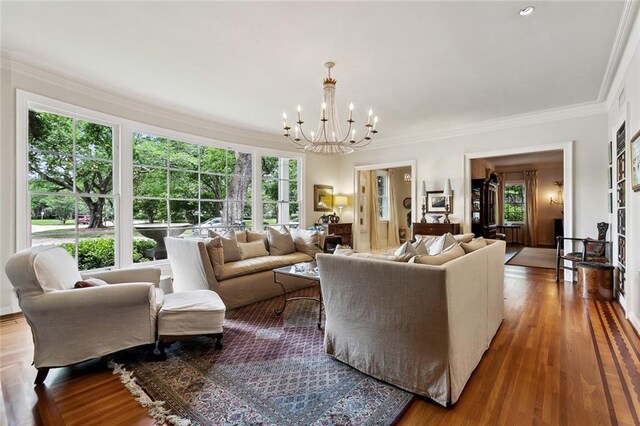 105 Mulberry Dr, Metairie, LA 70005 - living area with a chandelier, crown molding, and wood finished floors