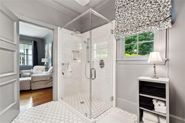 105 Mulberry Dr, Metairie, LA 70005 - ensuite bathroom featuring crown molding and a shower stall