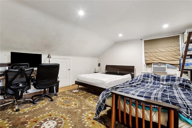 105 Mulberry Dr, Metairie, LA 70005 - bedroom with a desk, lofted ceiling, recessed lighting, and wood finished floors
