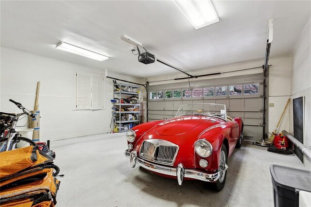 105 Mulberry Dr, Metairie, LA 70005 - garage featuring a garage door opener