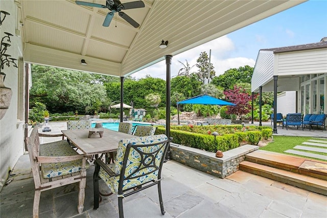 105 Mulberry Dr, Metairie, LA 70005 - view of patio / terrace with a ceiling fan, outdoor dining space, and an outdoor pool