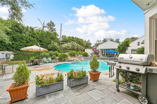 105 Mulberry Dr, Metairie, LA 70005 - swimming pool featuring a patio, a grill, and outdoor dining space