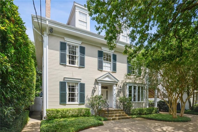 1923 State St, New Orleans, LA 70118 - view of front of property with a chimney