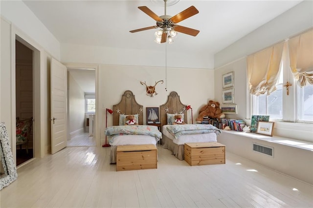 1923 State St, New Orleans, LA 70118 - bedroom with a ceiling fan and light wood-type flooring