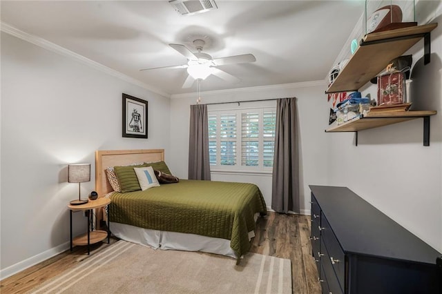 5844 Fleur De Lis Dr, New Orleans, LA 70124 - bedroom with wood finished floors, baseboards, ornamental molding, and ceiling fan