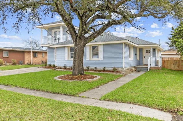 1705 Haring Rd, Metairie, LA 70001 - view of front of home featuring a balcony and a shingled roof
