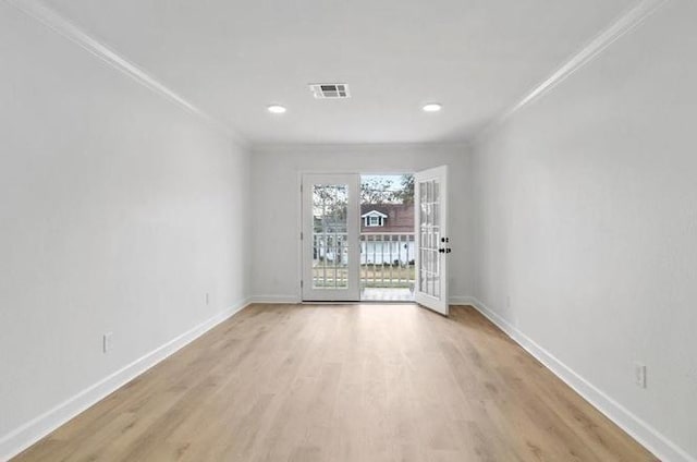 1705 Haring Rd, Metairie, LA 70001 - empty room with ornamental molding, baseboards, light wood-type flooring, and recessed lighting