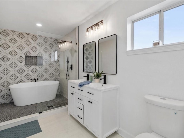 1705 Haring Rd, Metairie, LA 70001 - bathroom featuring vanity, a freestanding tub, toilet, tiled shower, and recessed lighting