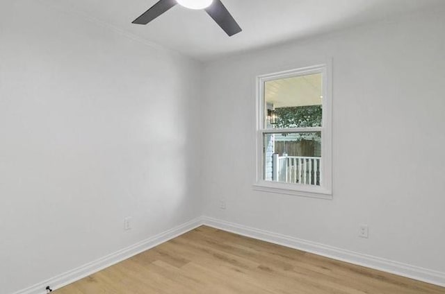 1705 Haring Rd, Metairie, LA 70001 - empty room with a ceiling fan, light wood-style flooring, and baseboards
