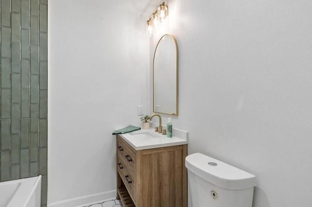 1705 Haring Rd, Metairie, LA 70001 - full bath featuring vanity, toilet, and baseboards