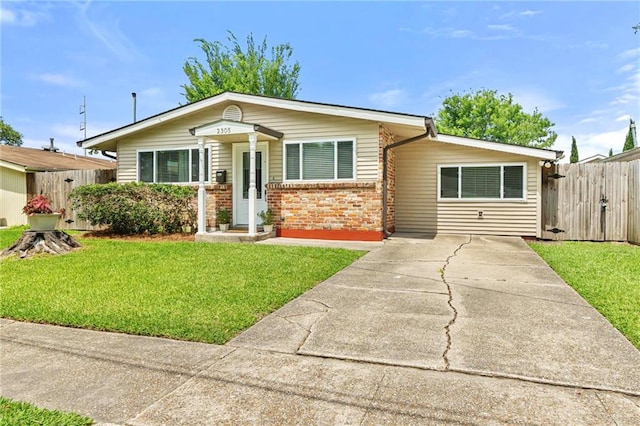 2305 Generes Dr, Harahan, LA 70123 - view of front of home with brick siding and driveway