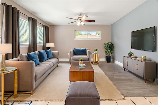 2305 Generes Dr, Harahan, LA 70123 - living room with a ceiling fan and light wood-type flooring