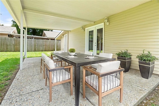 2305 Generes Dr, Harahan, LA 70123 - view of patio featuring french doors and outdoor dining space