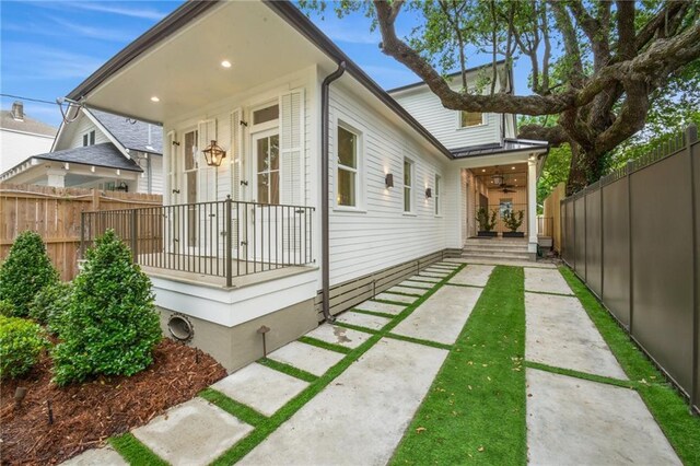 1015 Cadiz St, New Orleans, LA 70115 - view of property exterior featuring covered porch