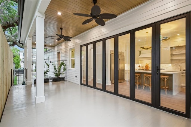 1015 Cadiz St, New Orleans, LA 70115 - view of patio featuring a ceiling fan and french doors
