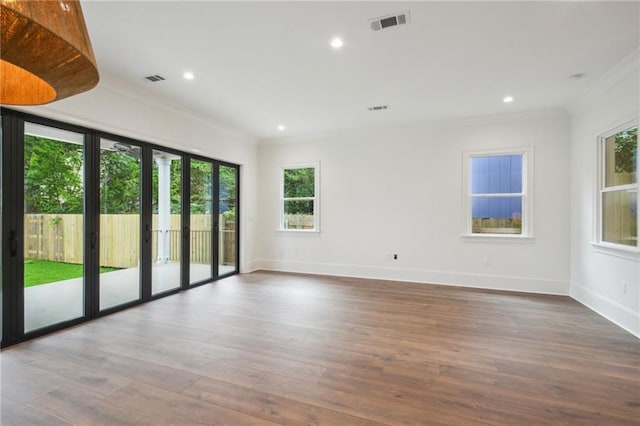 1015 Cadiz St, New Orleans, LA 70115 - unfurnished room featuring ornamental molding, wood finished floors, baseboards, and recessed lighting