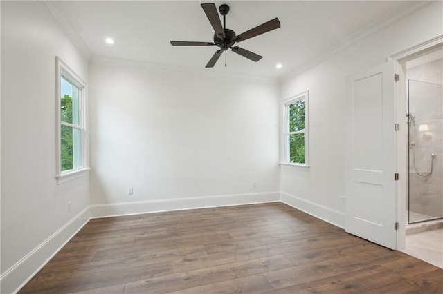 1015 Cadiz St, New Orleans, LA 70115 - unfurnished room with crown molding, dark wood-style flooring, recessed lighting, ceiling fan, and baseboards