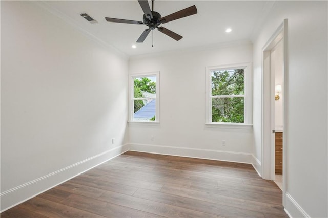 1015 Cadiz St, New Orleans, LA 70115 - empty room with ornamental molding, baseboards, dark wood-style floors, a ceiling fan, and recessed lighting