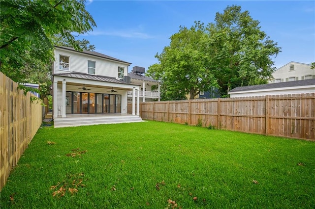 1015 Cadiz St, New Orleans, LA 70115 - back of property with ceiling fan, a standing seam roof, and metal roof