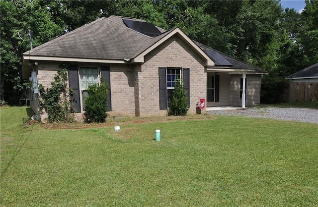 1613 Live Oak St, Slidell, LA 70460 - single story home featuring a shingled roof, a front lawn, and brick siding