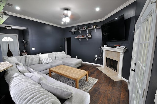 1613 Live Oak St, Slidell, LA 70460 - living area with wood finished floors, a premium fireplace, ornamental molding, ceiling fan, and recessed lighting