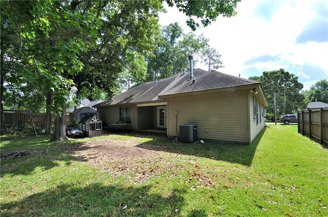 1613 Live Oak St, Slidell, LA 70460 - rear view of house featuring roof with shingles