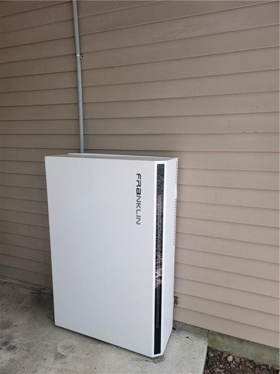1613 Live Oak St, Slidell, LA 70460 - exterior view of wall-mounted power storage