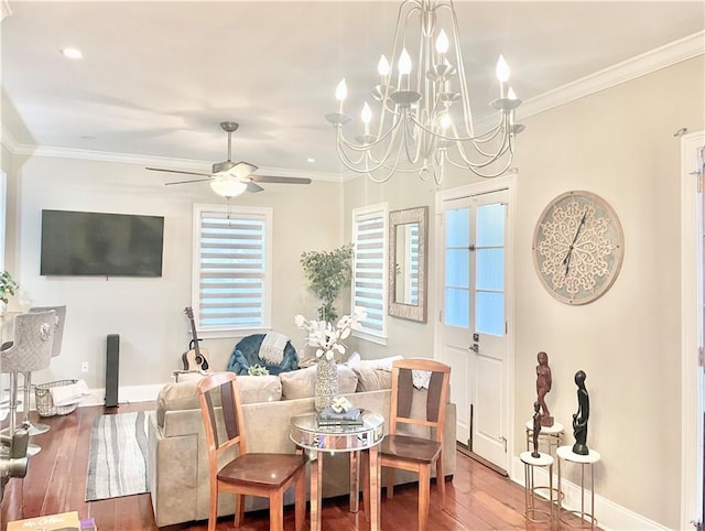 714 Third St, New Orleans, LA 70130 - living room featuring hardwood / wood-style floors, baseboards, a chandelier, ornamental molding, and ceiling fan