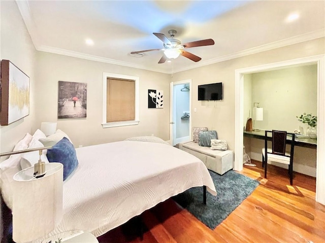 714 Third St, New Orleans, LA 70130 - bedroom with wood finished floors, crown molding, ceiling fan, and recessed lighting