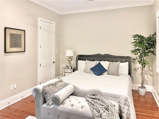 714 Third St, New Orleans, LA 70130 - bedroom featuring wood finished floors, baseboards, and crown molding