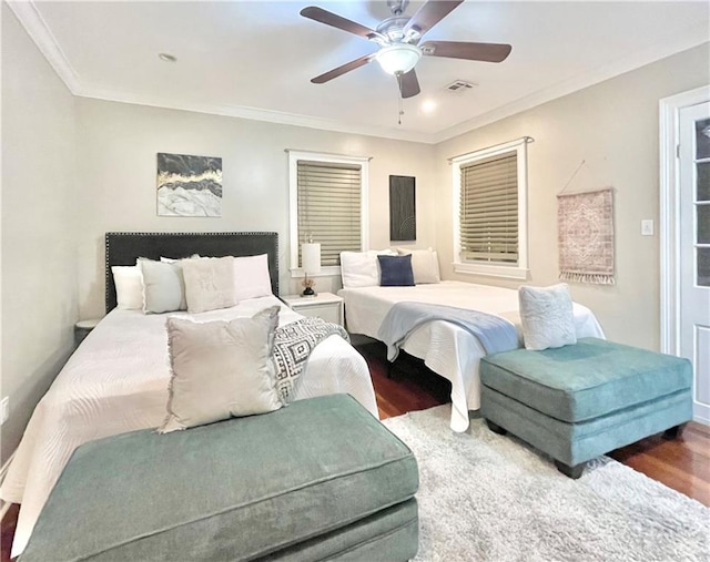 714 Third St, New Orleans, LA 70130 - bedroom with wood finished floors, crown molding, ceiling fan, and recessed lighting