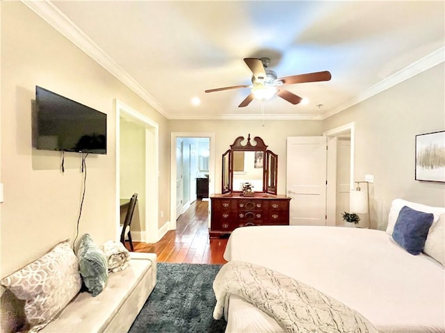 714 Third St, New Orleans, LA 70130 - bedroom with wood finished floors, crown molding, ceiling fan, and baseboards