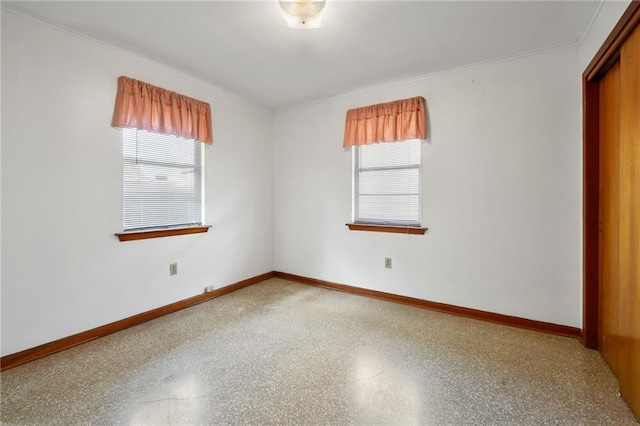 564 Saint Ann St, Marrero, LA 70072 - unfurnished room featuring baseboards, ornamental molding, and speckled floor